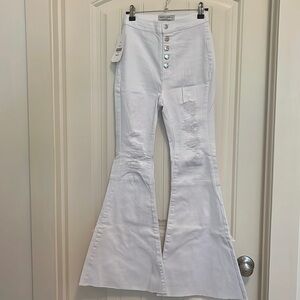 White ripped boot cut jeans from Dress Up